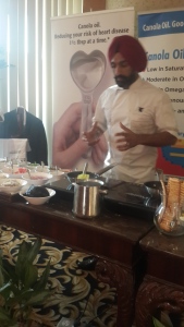 Chef Jolly demonstrating chick pea patty